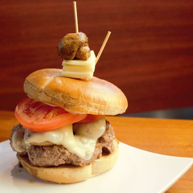 Indulge in Our Swiss Burger